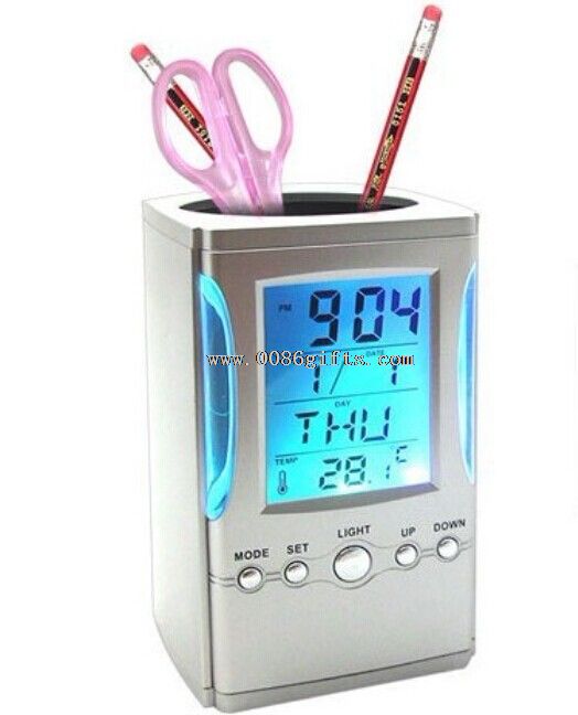 Digital clock with pen holder