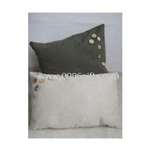 Coussin blanc et brun