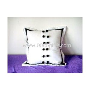 Coussin de tissu de coton blanc et noir