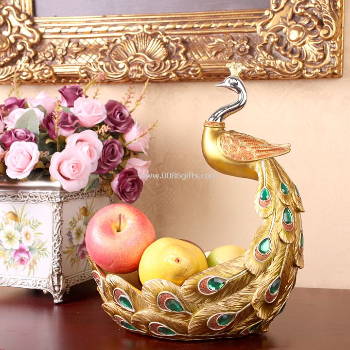 The peacock receive a box of fruit tray