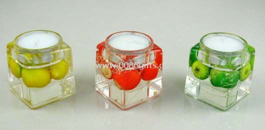 Liquid candle holder with floater