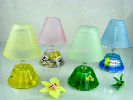 Liquid logo floater candle holder
