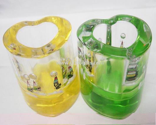 Liquid heart shape pen holder