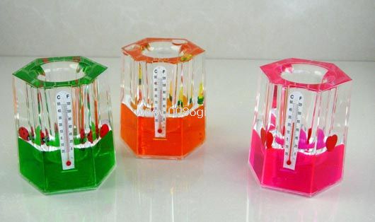 Liquid pen holder with thermometer