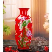 Kinesisk rød vase fisk form med lotus images