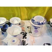Изящные полые Lithe и пронзил замечательные гравировки чайные сервизы синий и белый фарфор images