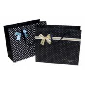 Søt sorte prikker dekorere buen papir Carrier Bag images