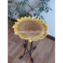 Yellow garden ornamental bird bath images