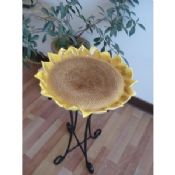 Yellow garden ornamental bird bath images