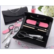 Brown color in matal frame manicure set gift pouch images