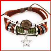 Pulsera estrella con madera y granos de la arcilla images